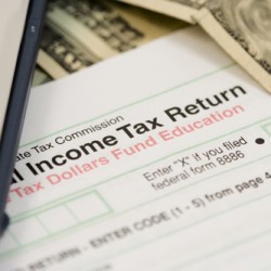 Picture of tax return form and money