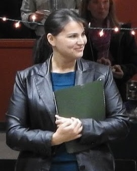 Nadia holding folder