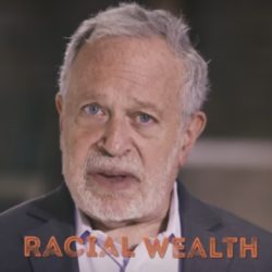 Man with racial wealth text