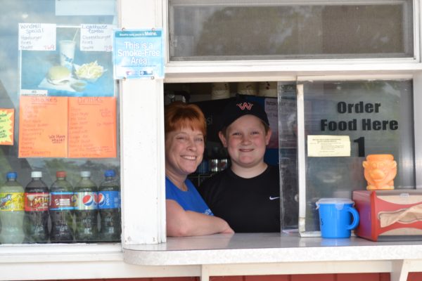 Mother and son at window of the Dutch Treat