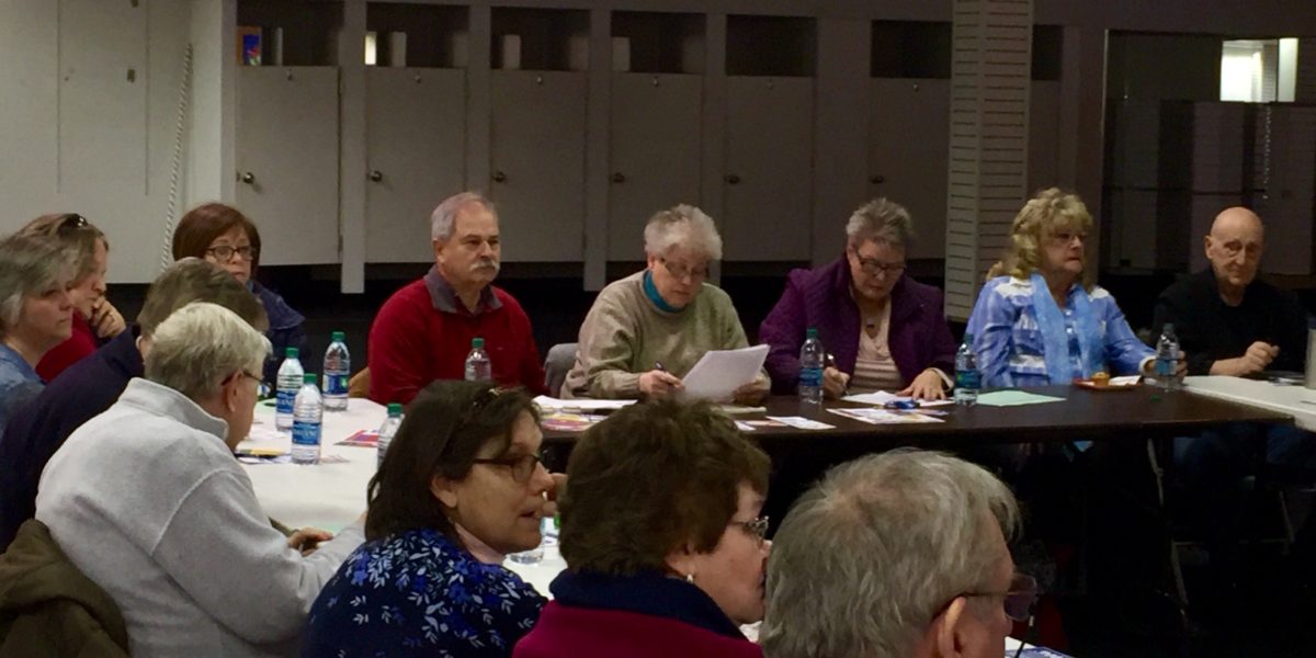 several people sitting at tables