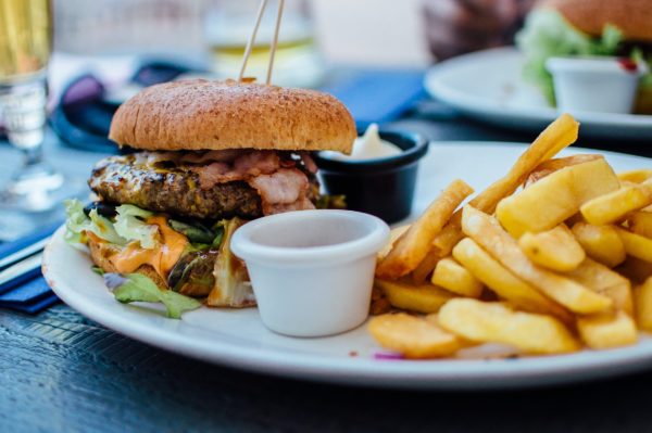 cheeseburger and french fries on a plate