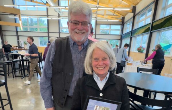 photo of Gene and Nancy with community award
